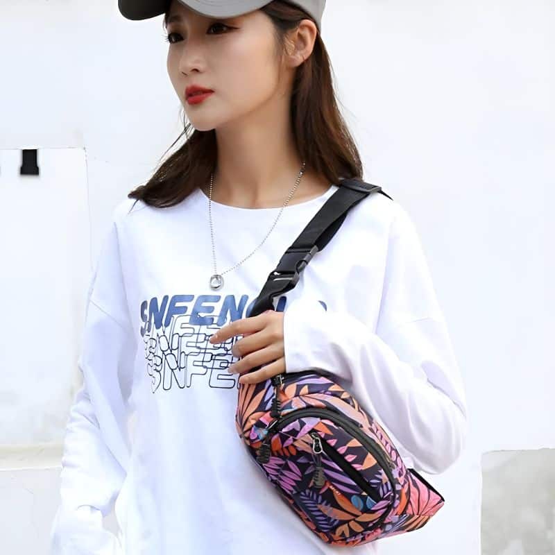 Floral fanny pack worn over the shoulder