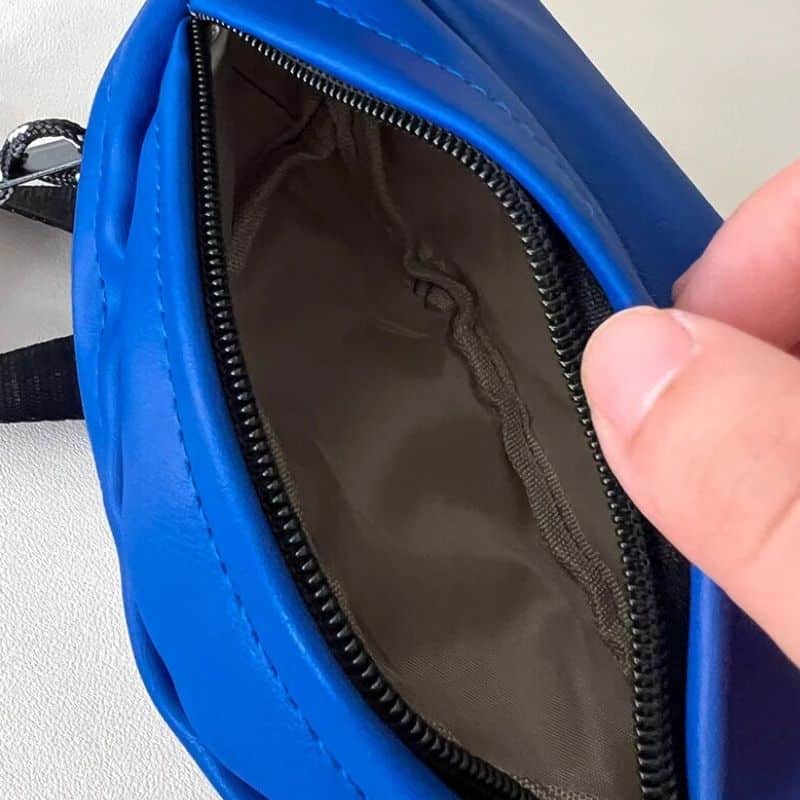 A dark blue leather fanny pack for girls quality