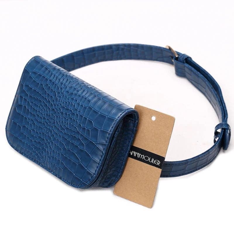 Blue crocodile fanny pack seen in profile